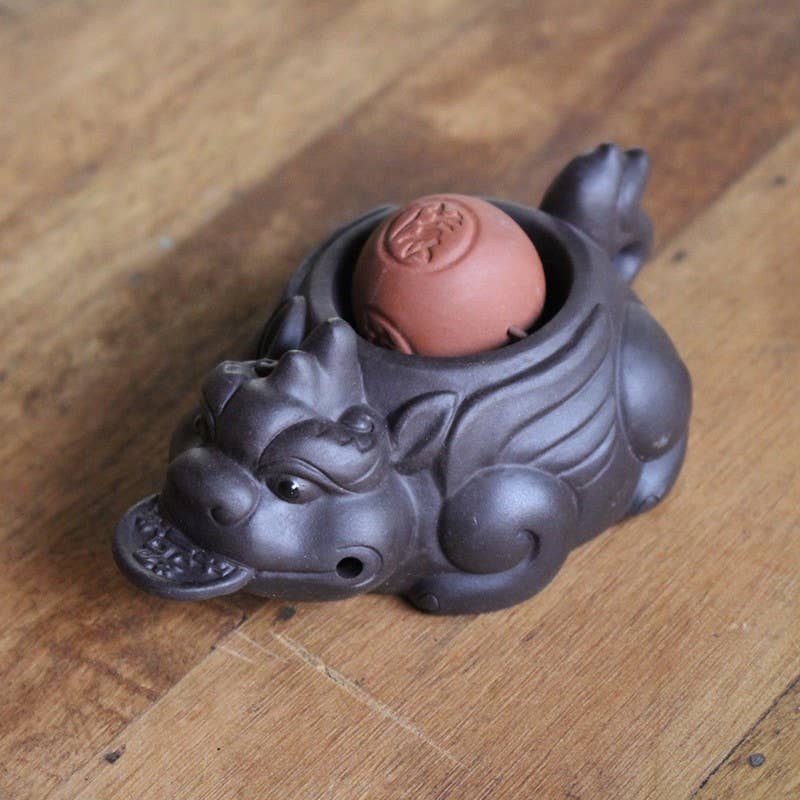 Dragon tea figurine with ceramic ball