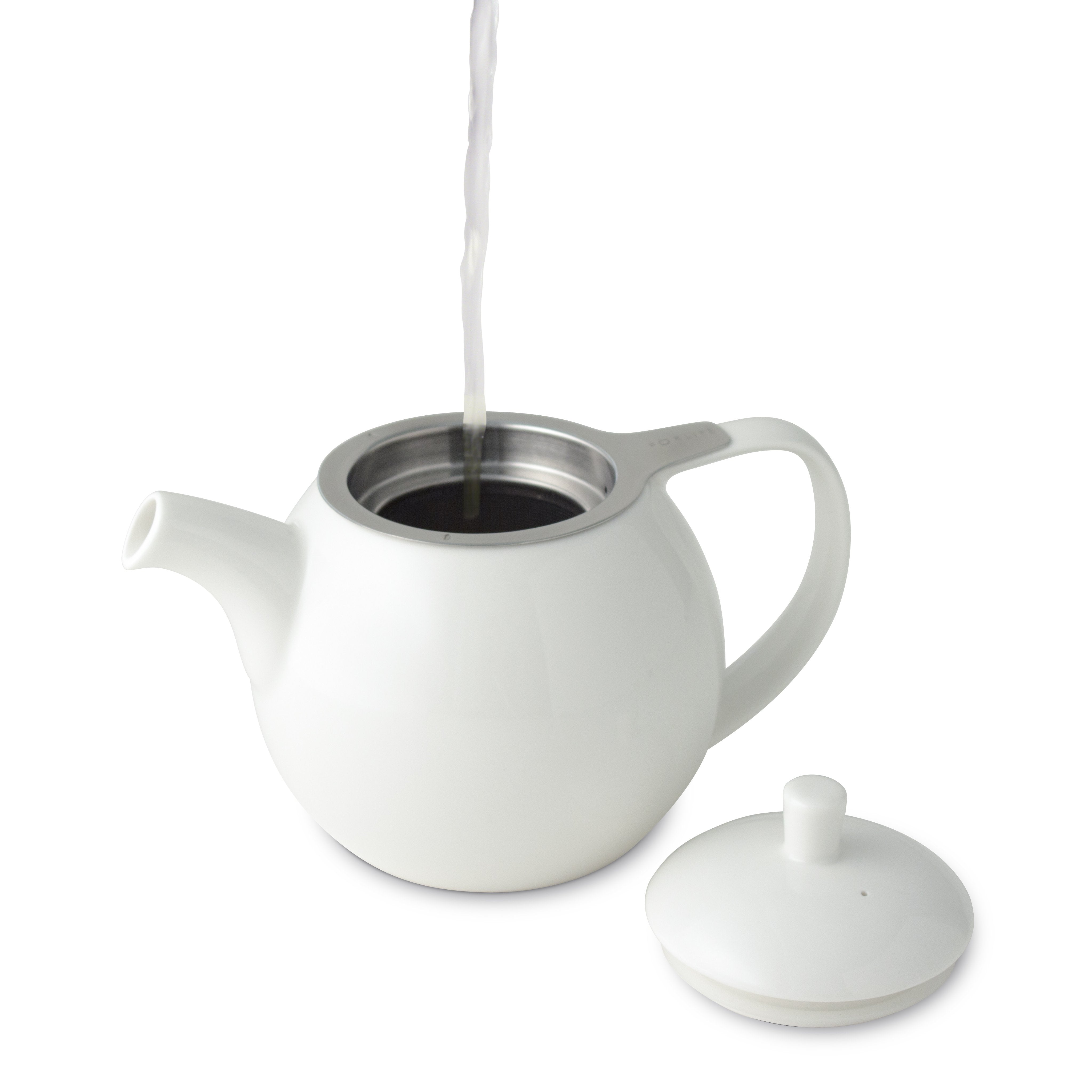 stream of water being poured into a open TeaLula 24 oz Curve sphere white Teapot glossy surface finish and white lid on the side 